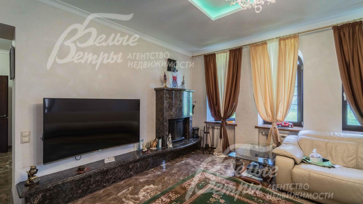 Камин, облицованный мрамором