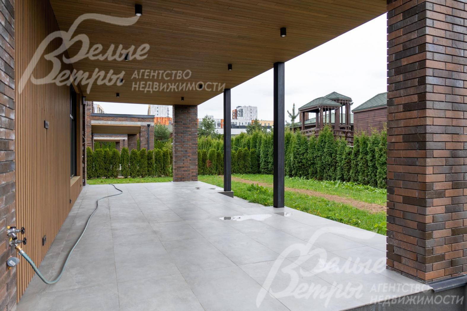 Вид с террасы на участок