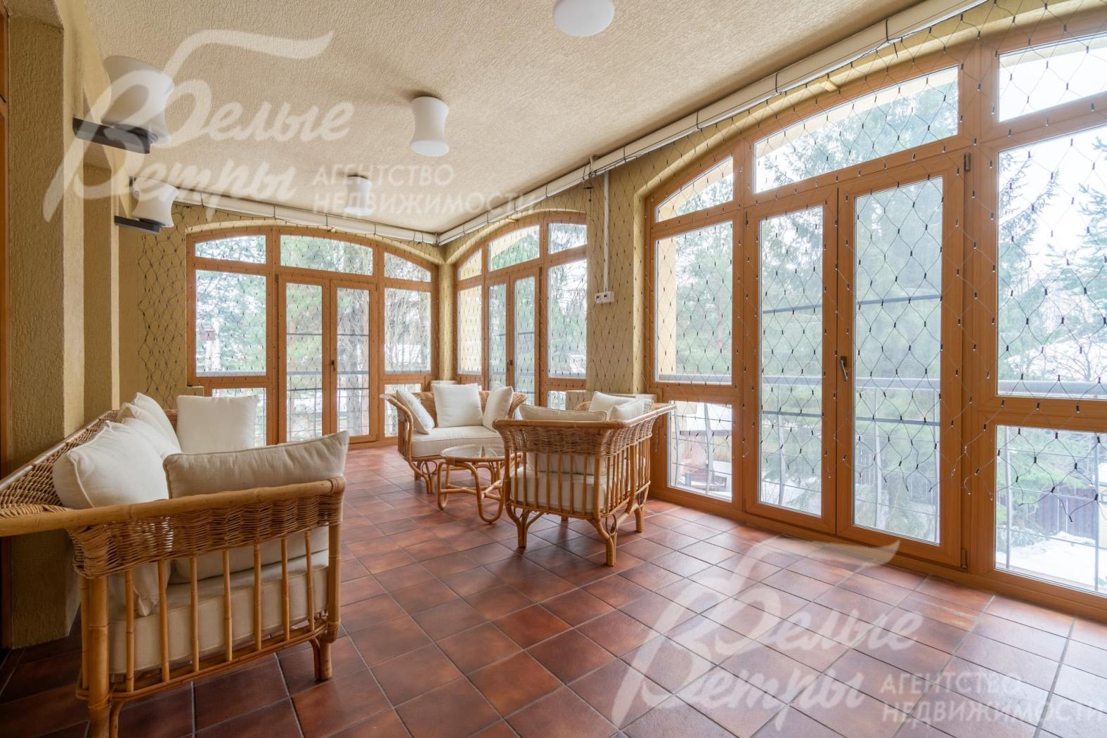 Зимний сад с панорамным остеклением на втором этаже