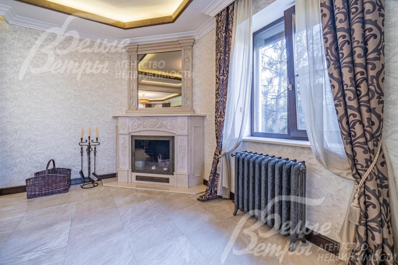 Дровяной камин, отделанный мрамором