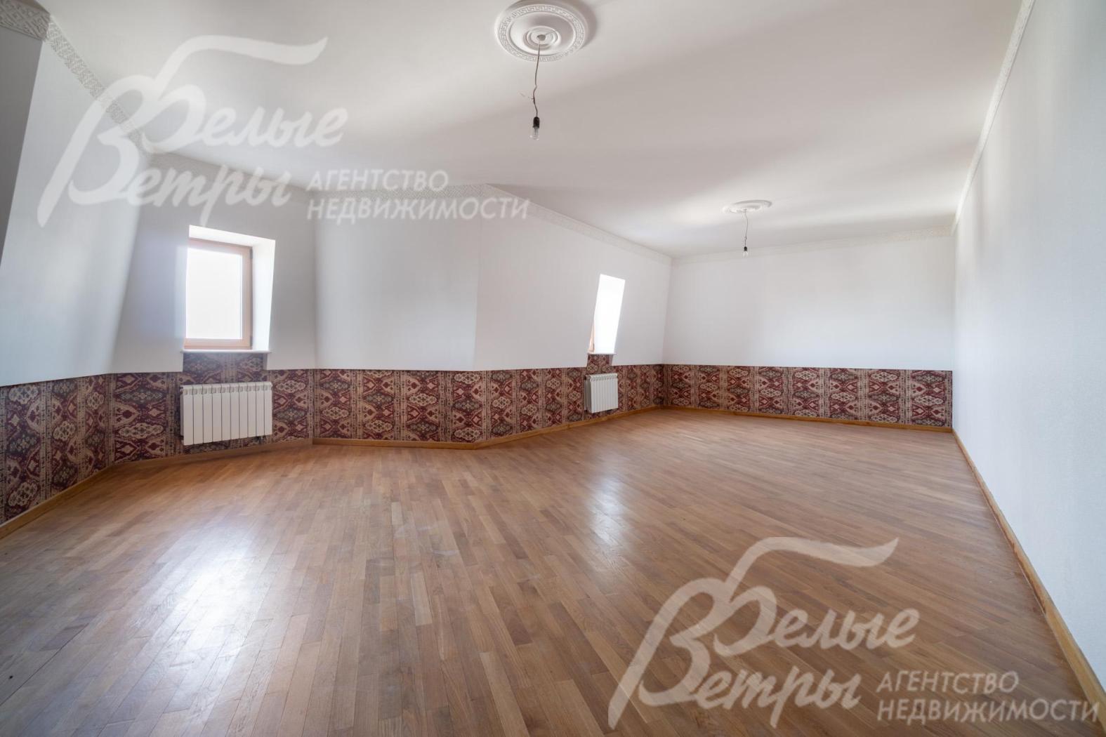 Одна из комнат на мансардном этаже, в которой может находиться спальня, кабинет или кинозал