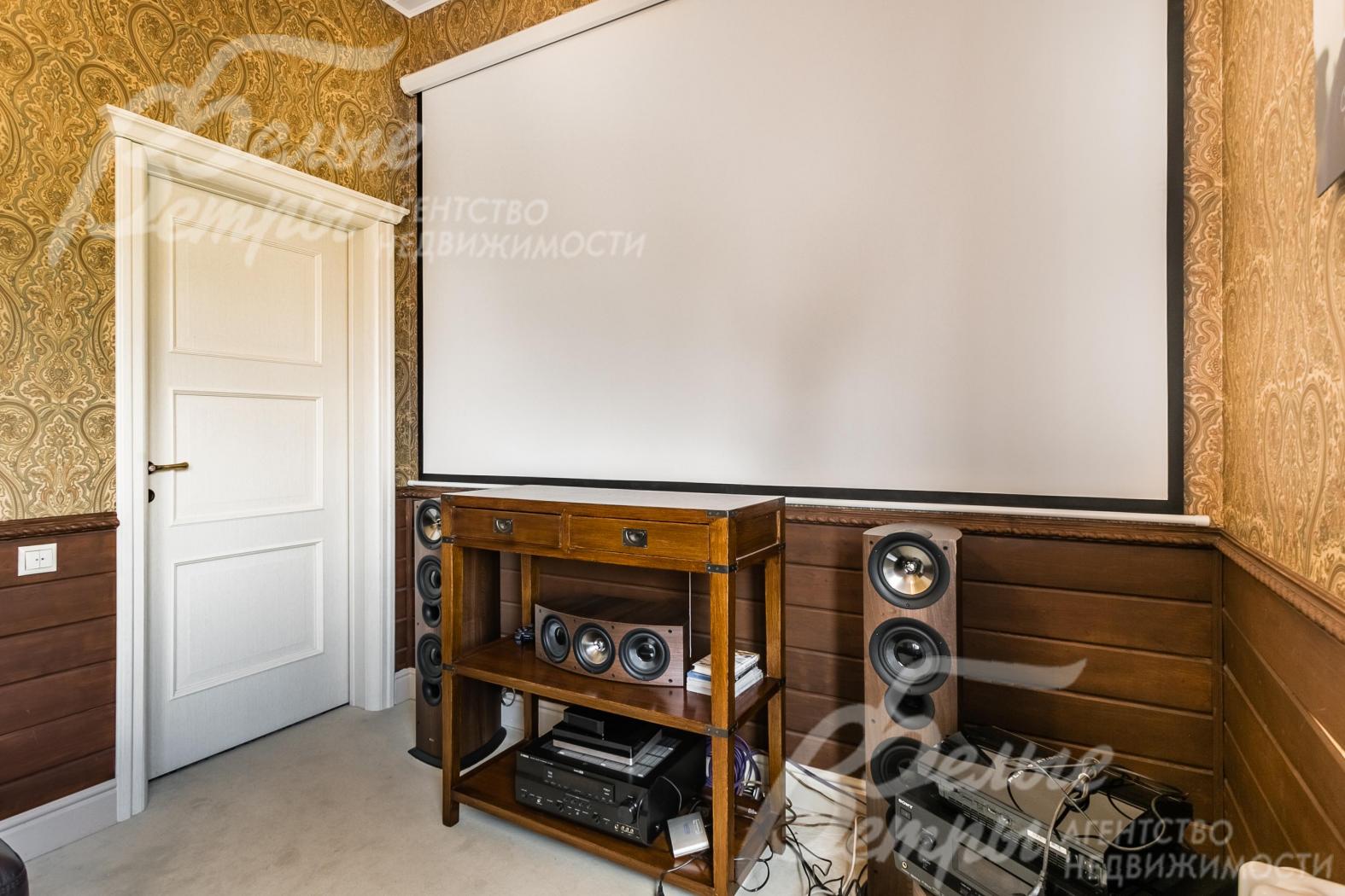 Кинозал-гостевая спальня