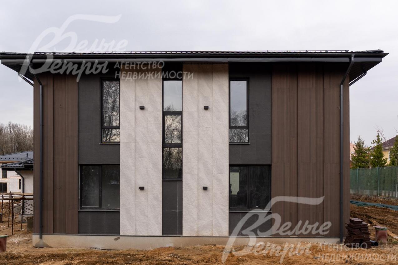 Дом в современном стиле на участке 8 соток