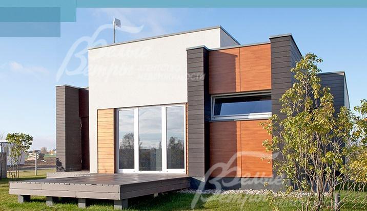 Панорамные окна в гостиной с камином