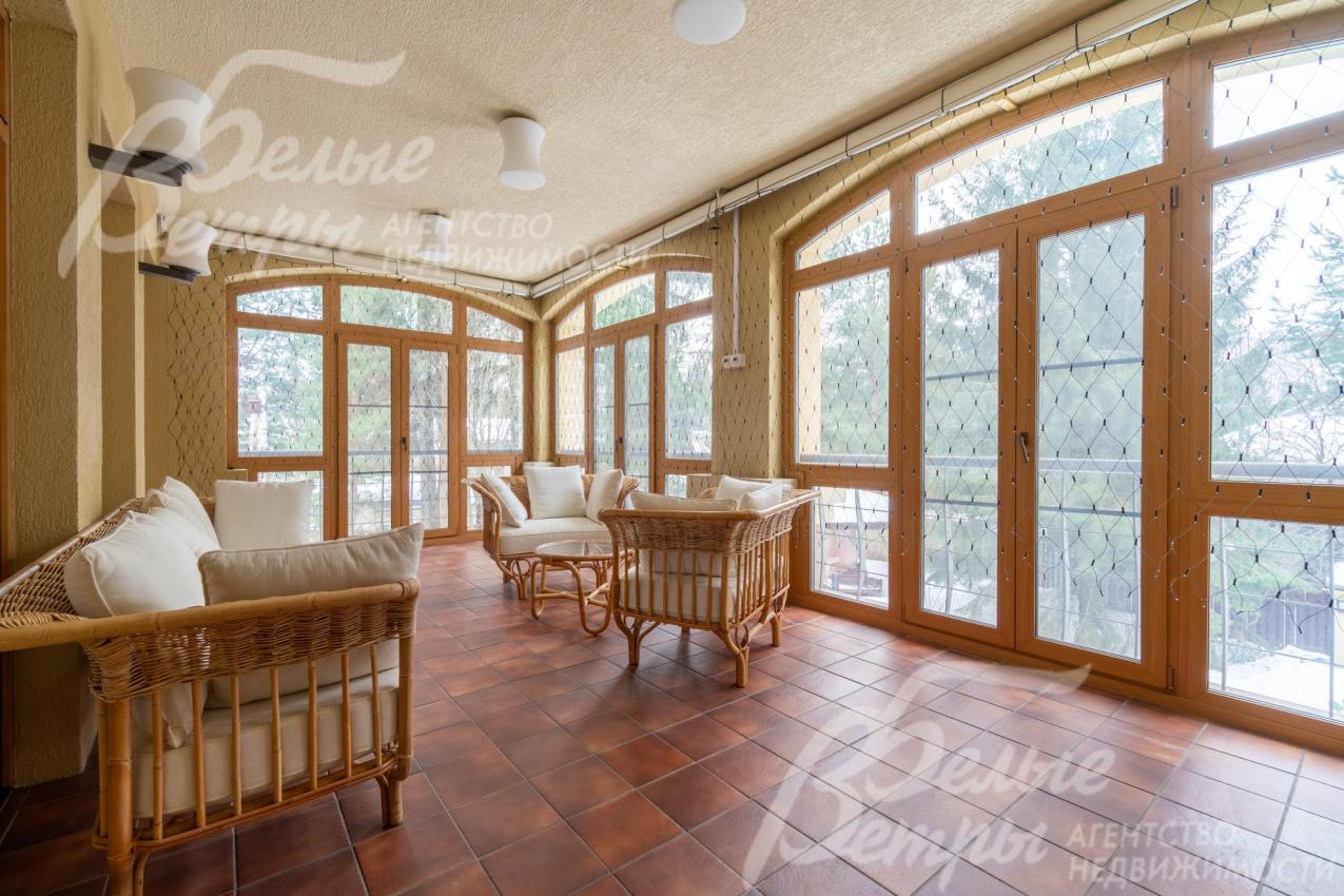 Зимний сад с панорамным остеклением на втором этаже